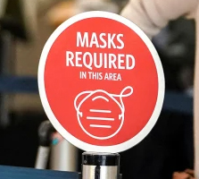 'Masks required' sign courtesy of Reuters