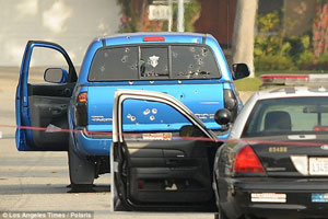 Police shot this truck 102 times without provocation in the Dorner manhunt.  (Source: LA Times)